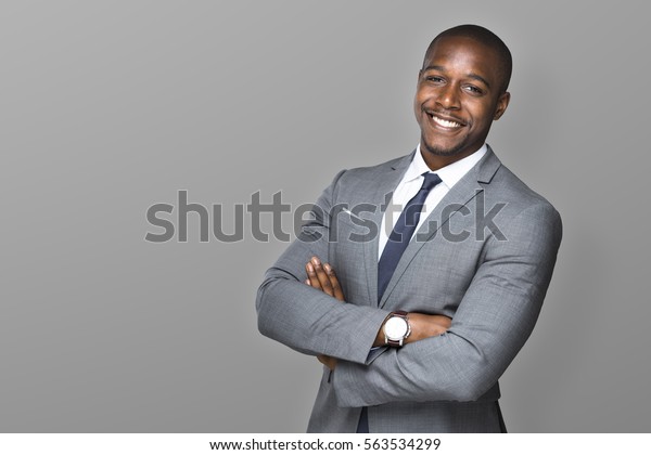 attractive-handsome-happy-smiling-professional-600w-563534299.jpg